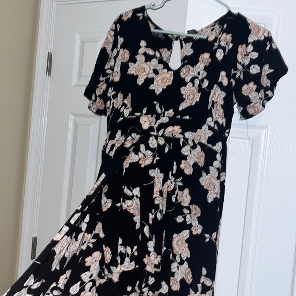 Angie’s medium romper with long dress look, slit in front, covered in back.